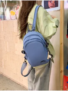Lässiger Nylon Mini Rucksack für Damen, stilvoller multifunktionaler Tagesrucksack Anhänger.