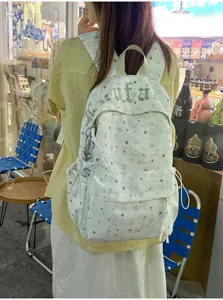 Korean style star print casual backpack for women, cute travel school bag for daily use.