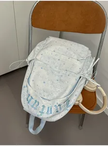 Korean INS style star pattern backpack, large capacity casual school bag with shoulder straps.