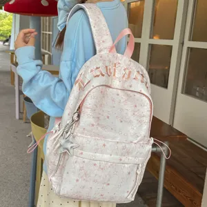 Korean ins style star print backpack for women, sweet travel school bag with pendant.