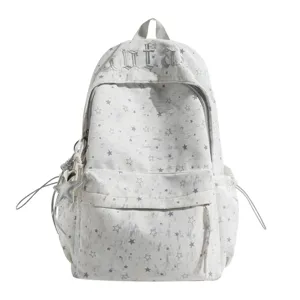 Korean style star pattern canvas backpack for students, large capacity casual school bag.