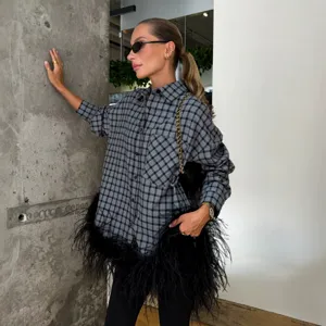 Oversized grey plaid long sleeve button-down shirt with feather hem for women fashion.