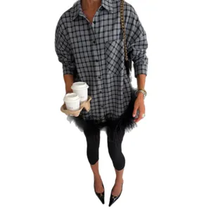 Fashionable oversized plaid long sleeve shirt with trendy feather hem for autumn daily wear.