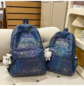 Korean style starry print backpack set for students, casual school bag with cute plush pendant.