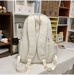 Weißer Schulrucksack mit Sternenmuster für Schüler, leichter Freizeitrucksack mit vielen Fächern.
