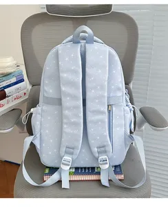 Light blue school backpack with white star print, cute casual daypack for students.