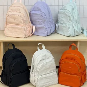 Casual lightweight travel backpack for women, multi-color school rucksack, daily commuter bag.