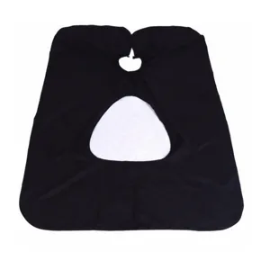 Black haircut cape detail with transparent phone viewing window, salon styling apron.