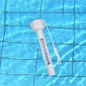 Detailed view of white floating pool thermometer with clear Fahrenheit and Celsius scale for water.