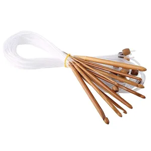 Carbonized wooden Tunisian crochet hook detail with clear extension cable and end bead.
