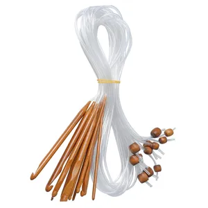 Carbonized wooden Tunisian crochet hooks set with clear plastic cables and wooden beads for crafts.