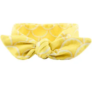 Gros plan détaillé du bandeau bébé motif citron jaune avec nœud mignon pour charmant.
