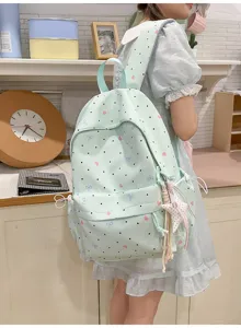 Cute Japanese style pastel green school backpack with cute bows and hearts pattern