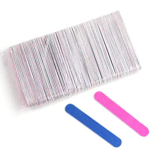 Detail view of bulk nail files set with pink and blue emery boards in clear plastic packaging.