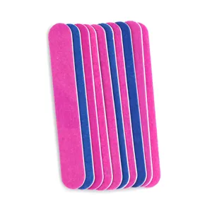 Sandpaper nail file detail view, dual color pink and blue manicure polishing strip tool.