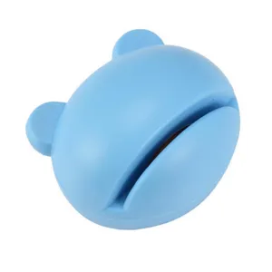 Mini blue bear knife sharpener detail, portable kitchen sharpening tool closeup view.