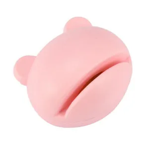 Close-up detail view of the pink portable mini bear knife sharpener sharpening slot.