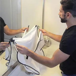 Men shaving beard catcher cape with suction cups for bathroom grooming and hair trimming use