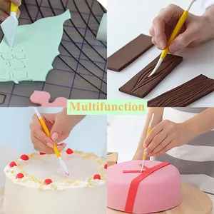 Vue detaillee des outils de decoration de gateaux en fondant et stylos de sculpture DIY.