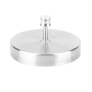 Stainless steel burger press detail view, kitchen patty maker tool for homemade burgers.