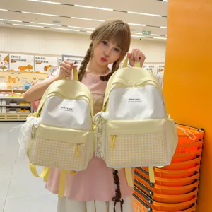 Cute ins style polka dot plaid backpack for school and travel, lightweight and large capacity.
