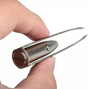 Close-up detail of stainless steel LED lighted precision eyebrow tweezers tip and body.