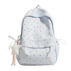 Sweet Japanese style light blue polka dot backpack with cute star pendant for school girls.