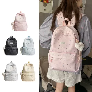 Japanese style sweet star pattern canvas backpack for school girls, lightweight and stylish.