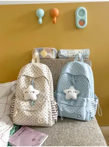 Casual star print school backpack with cute plush star pendant, stylish student daily bag.