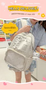 Mochila ita blanca con bolsillo frontal transparente, estampado de estrellas y bonito colgante de oso.