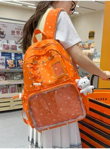 Mochila ita de estrella naranja con ventana transparente, bolso escolar elegante para viaje.