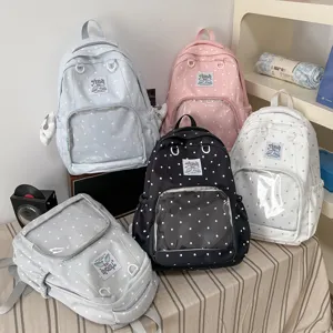 Cute Japanese style polka dot ita backpack with clear front pocket for daily school use.