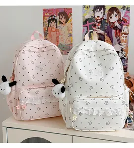 Zaino scolastico in stile preppy carino con stampa a pois e stelle e volant.