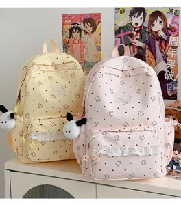 Zaino scolastico carino con stampa di stelle per ragazze, stile college casual con dettagli.