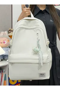 Minimalist large capacity white canvas backpack with multiple pockets for daily travel and school.