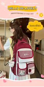 Casual student school backpack with cute rabbit pendant, multi-pocket red plaid design.