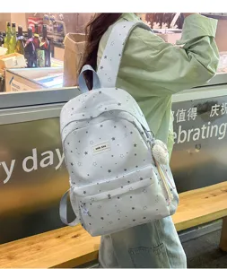 Casual star print school backpack for women, cute Japanese style travel daypack bag.