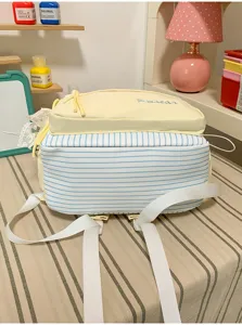 Cute Japanese style canvas backpack with blue and white stripes and sweet pastel yellow top.