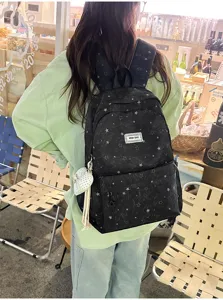 Japanese style star print casual backpack for women, lightweight school bag for daily use.