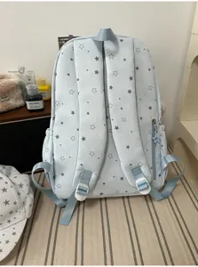 Light blue star print backpack detail view, cute Japanese style school bag for daily use.