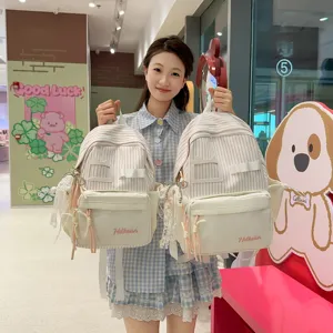 Japanese cute striped girl backpack with front pocket, lace ribbon and stylish daily design.