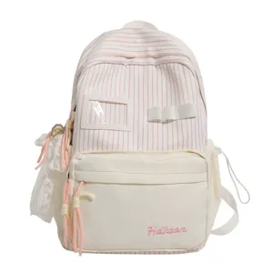 Cute pink striped backpack for girls with transparent window, bow and lace pendant. Sweet style.