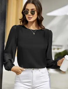 Detail shot of the elegant black crewneck long sleeve blouse for modern office and casual wear.