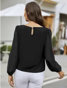 Details of the elegant black long sleeve blouse with crew neck and back button design for women.
