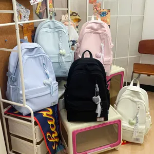 Minimalist large capacity backpack for school and travel, multi-color lightweight casual daypack.