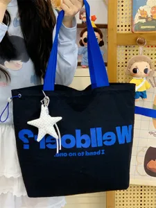 Korean style dopamine canvas tote bag casual large capacity shoulder bag with blue straps.