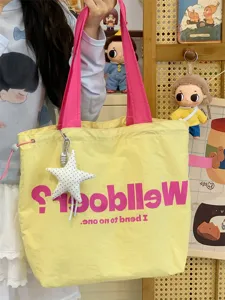 Korean dopamine canvas tote bag for women, large capacity commuter shoulder bag with cute star pendant.