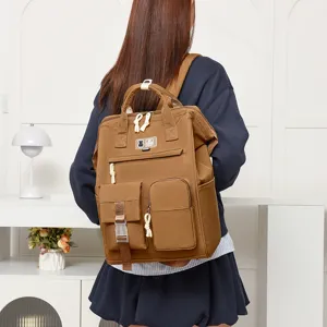 Stylish brown multi-pocket casual backpack for women, ideal for daily commute, travel and school.