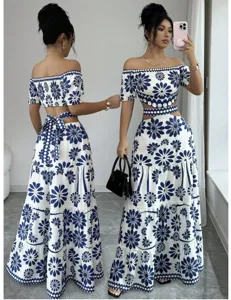 Blue and white floral off shoulder crop top and tiered maxi skirt two piece set for women.