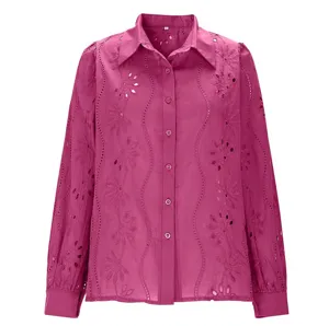 Detail view of pink long sleeve button down shirt with floral eyelet embroidery and lapel.